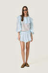 Airy baby blue chiffon blouse with oversized ruffle details - SS26